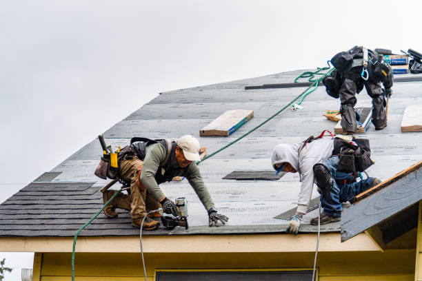 Professional Flat Roof Repair technician working in Camillus, NY